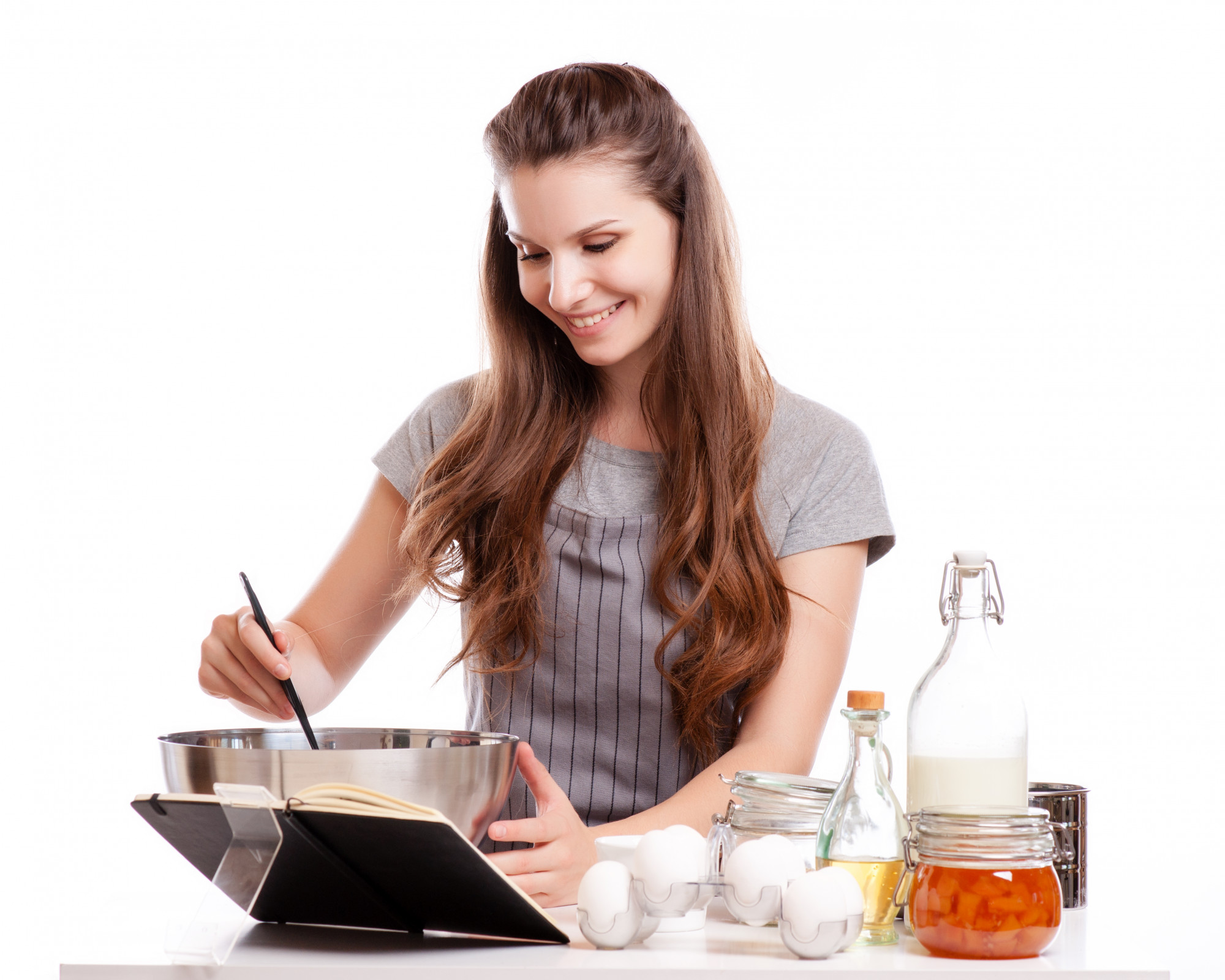 Student cooking in kitchen